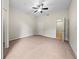 Spacious bedroom with carpeted floors and ceiling fan at 17112 Carrington Park Dr # 922, Tampa, FL 33647