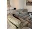 Elegant living room with comfortable seating and a neutral color scheme at 9481 Highland Oak Dr # 505, Tampa, FL 33647