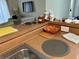 Kitchen counter with various items, showing ample space at 9481 Highland Oak Dr # 505, Tampa, FL 33647