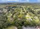 Aerial view showcasing the property's surroundings and neighborhood at 26831 Chianina Dr, Wesley Chapel, FL 33544