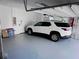 Attached garage with ample space for one car and additional storage at 717 Manns Harbor Dr, Apollo Beach, FL 33572