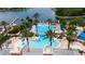 Resort-style pool area with lap pool, water features, and lounge area at 717 Manns Harbor Dr, Apollo Beach, FL 33572