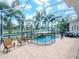 Enjoy this relaxing pool and patio area, complete with a screened enclosure at 717 Manns Harbor Dr, Apollo Beach, FL 33572