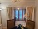 Cozy dining room with decorative lighting and an open view to the adjacent sitting area at 860 19 N Ave, St Petersburg, FL 33704