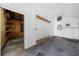 Clean, airy garage interior with painted walls, concrete floor, functional shelving, and fan at 860 19 N Ave, St Petersburg, FL 33704