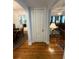 Hallway features hardwood floors and arched doorways leading to other rooms in the home at 860 19 N Ave, St Petersburg, FL 33704