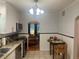 Efficient kitchen with stainless steel appliances, granite countertops and an opening to the Gathering room at 860 19 N Ave, St Petersburg, FL 33704