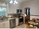 Updated kitchen featuring stainless steel appliances and granite countertops at 860 19 N Ave, St Petersburg, FL 33704