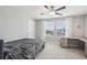 Bright bedroom with a desk and large window at 2848 Gridiron Isle, New Port Richey, FL 34655