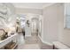 Elegant entry with tile floors, arched doorway, and a view into the living area at 2848 Gridiron Isle, New Port Richey, FL 34655