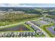 Aerial view of lakefront homes and community at 2848 Gridiron Isle, New Port Richey, FL 34655