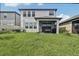 Two story home with covered patio and fenced backyard at 2848 Gridiron Isle, New Port Richey, FL 34655