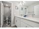 Bathroom with double vanity and access to another room at 2848 Gridiron Isle, New Port Richey, FL 34655