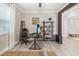 Modern home office with built-in shelving and a large desk at 2848 Gridiron Isle, New Port Richey, FL 34655