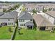Aerial view of homes with backyard and community at 2848 Gridiron Isle, New Port Richey, FL 34655