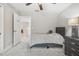 Bright bedroom with a twin bed and access to another room at 2848 Gridiron Isle, New Port Richey, FL 34655