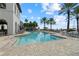 Resort-style pool with plenty of lounge chairs at 5823 Bowen Daniel Dr # 906, Tampa, FL 33616