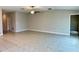 Spacious living room with tile flooring and ceiling fan at 10411 Alder Green Dr, Riverview, FL 33578