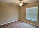 Simple bedroom with neutral walls, carpet, and window blinds at 10411 Alder Green Dr, Riverview, FL 33578