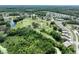 Stunning aerial view of a golf course community surrounded by lush greenery and tranquil lakes at 11920 Boynton Ln # 11920, New Port Richey, FL 34654