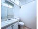 Clean bathroom featuring a vanity with a white sink and a toilet at 11920 Boynton Ln # 11920, New Port Richey, FL 34654