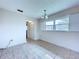 Bright dining area with tiled floors, a window, and access to a closet at 11920 Boynton Ln # 11920, New Port Richey, FL 34654