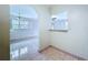 Open-concept living space with tile flooring and a view of adjacent rooms at 11920 Boynton Ln # 11920, New Port Richey, FL 34654