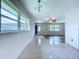 Inviting living area with tile flooring and abundant natural light at 11920 Boynton Ln # 11920, New Port Richey, FL 34654