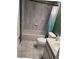Clean bathroom with a tub/shower combination and updated tile at 10908 Claymont Dr, New Port Richey, FL 34654