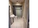Updated bathroom featuring a pedestal sink and a shower/tub combo at 10908 Claymont Dr, New Port Richey, FL 34654