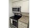 Kitchen boasts stainless steel appliances and granite countertops at 5440 S Macdill Ave # 1D, Tampa, FL 33611