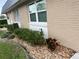 Neatly landscaped area with decorative rock at 11920 Boynton Ln # 11920, New Port Richey, FL 34654