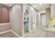 Hallway with linen closet and access to other rooms at 20617 Broadwater Dr, Land O Lakes, FL 34638