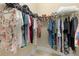 Spacious walk-in closet with clothing, shoes, and shelf storage at 933 Riverscape St, Bradenton, FL 34208