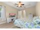 Main bedroom with white dresser and hydrangea bedding at 933 Riverscape St, Bradenton, FL 34208