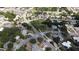 Wide aerial view of a residential area, showing streets and houses at 5163 Tangelo Dr, New Port Richey, FL 34652