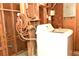 Unfinished laundry room with washer and exposed plumbing at 5163 Tangelo Dr, New Port Richey, FL 34652