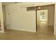 Open living area with tile flooring and access to another room at 5163 Tangelo Dr, New Port Richey, FL 34652