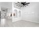 Bright living room with high ceilings and hardwood floors at 10616 Cape Hatteras Dr, Tampa, FL 33615