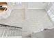 Open concept living room with hardwood floors and a view of the staircase at 10616 Cape Hatteras Dr, Tampa, FL 33615