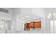 View of kitchen with wood cabinets, white countertops, and modern appliances at 10616 Cape Hatteras Dr, Tampa, FL 33615