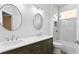 Bathroom with double vanity, quartz countertop, and modern fixtures at 10616 Cape Hatteras Dr, Tampa, FL 33615