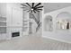 Spacious living room with fireplace, high ceilings, and hardwood floors at 10616 Cape Hatteras Dr, Tampa, FL 33615