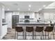 Modern kitchen featuring stainless steel appliances and gray counters at 156 175Th E Ave, Redington Shores, FL 33708