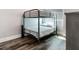 Bedroom with a metal bunk bed and plenty of floor space at 156 175Th E Ave, Redington Shores, FL 33708