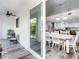 View of the kitchen and dining area from the patio at 156 175Th E Ave, Redington Shores, FL 33708