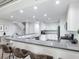 Modern kitchen with a large island and ample cabinet space at 156 175Th E Ave, Redington Shores, FL 33708