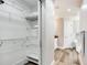 Well-organized closet with wire shelving, providing ample storage space at 156 175Th E Ave, Redington Shores, FL 33708