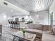 Modern kitchen with breakfast bar, stainless steel appliances, and ample counter space at 156 175Th E Ave, Redington Shores, FL 33708