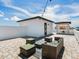 Relaxing rooftop terrace with seating area, pergola, and city views at 156 175Th E Ave, Redington Shores, FL 33708